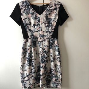 Mid length crepe dress with cut out details